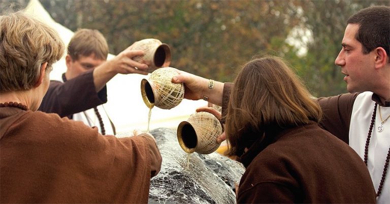 Pouring blessed water over the Shaligram