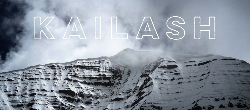 The summit of Mount Kailash with text reading KAILASH