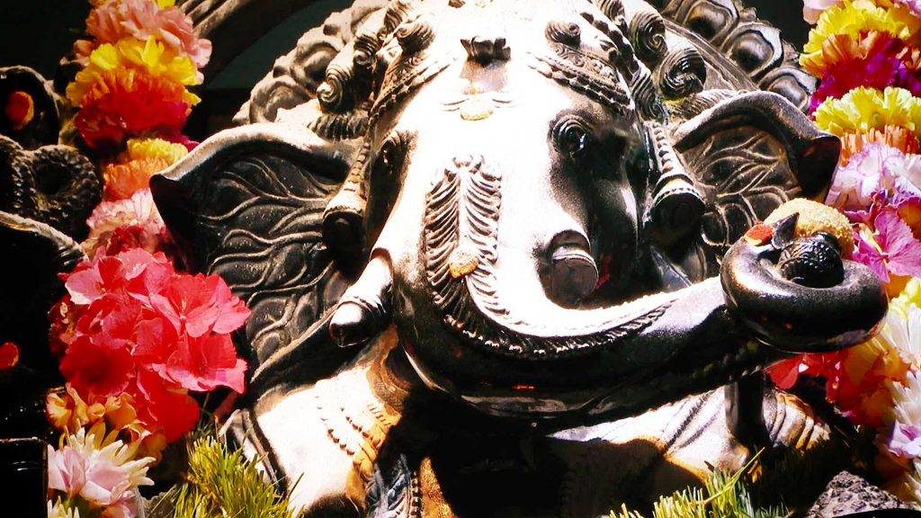 A high resolution picture of Lord Ganesh with vibhuti and garland during Ganesh Chaturthi festival