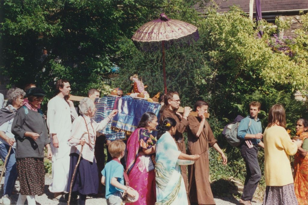 A worship procession with Devi and devotees in Skanda Vale in the early 1980's
