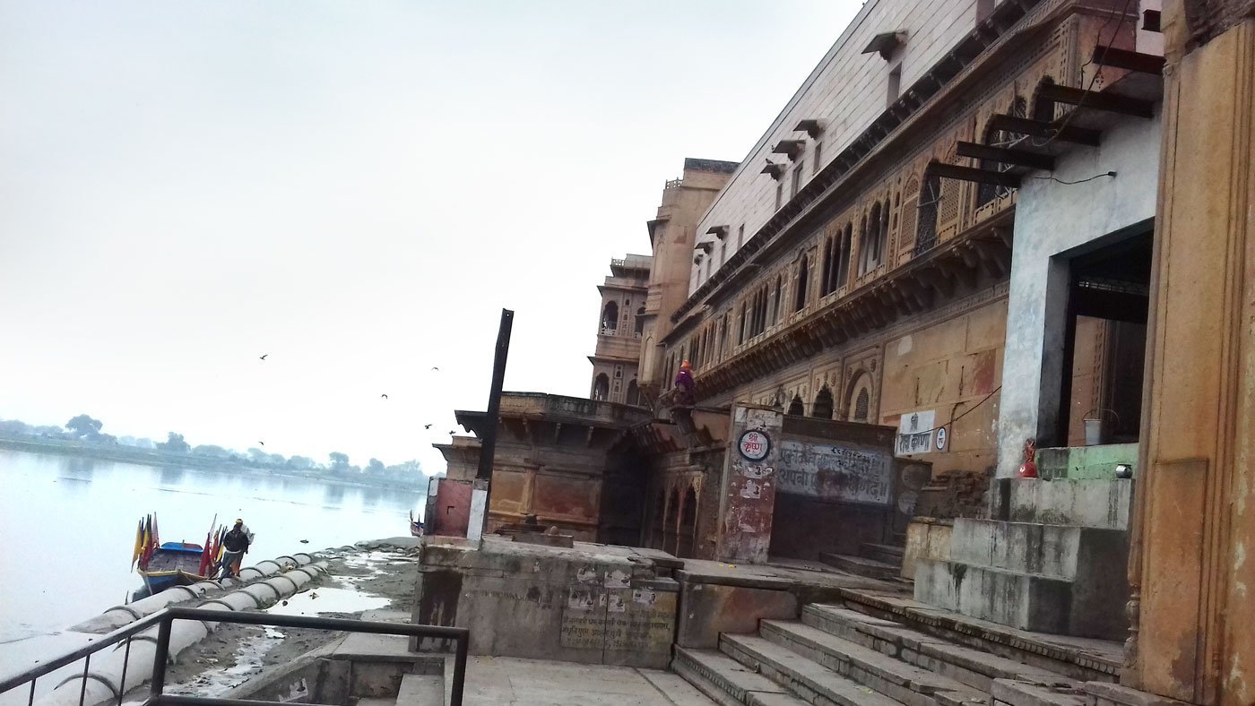 Temple buildings and steps descending to the river Yamuna