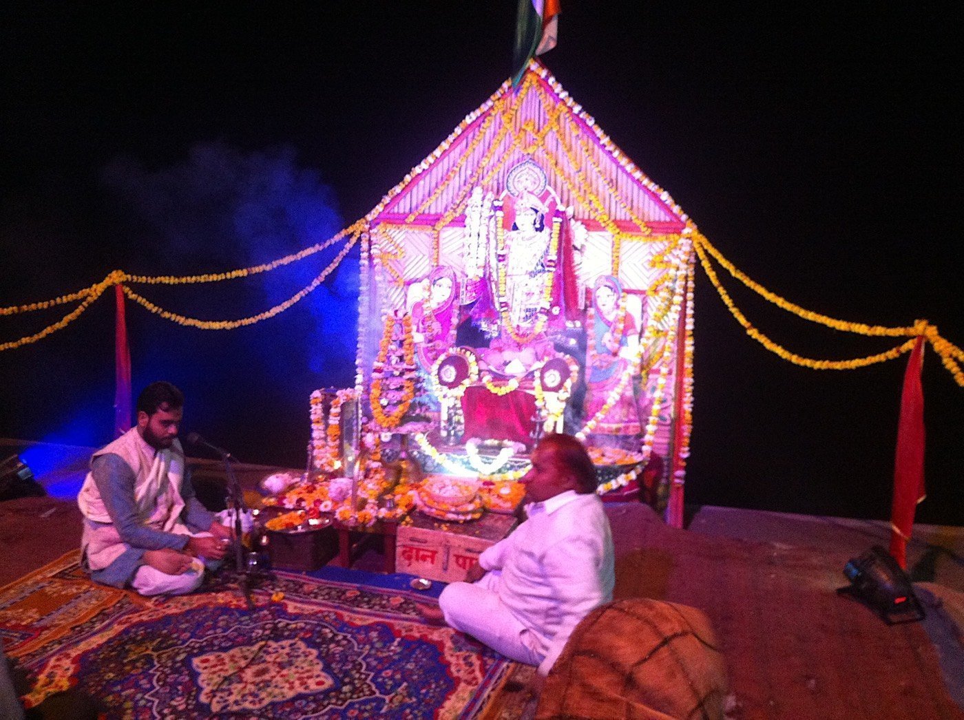 Priests offer a puja to Radha & Krishna at the ghats of the river Yamuna in Vrindavan