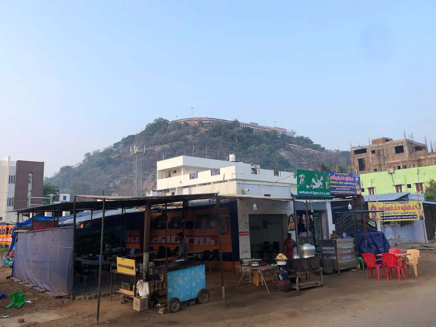 A street scene with Palani Temple in the background