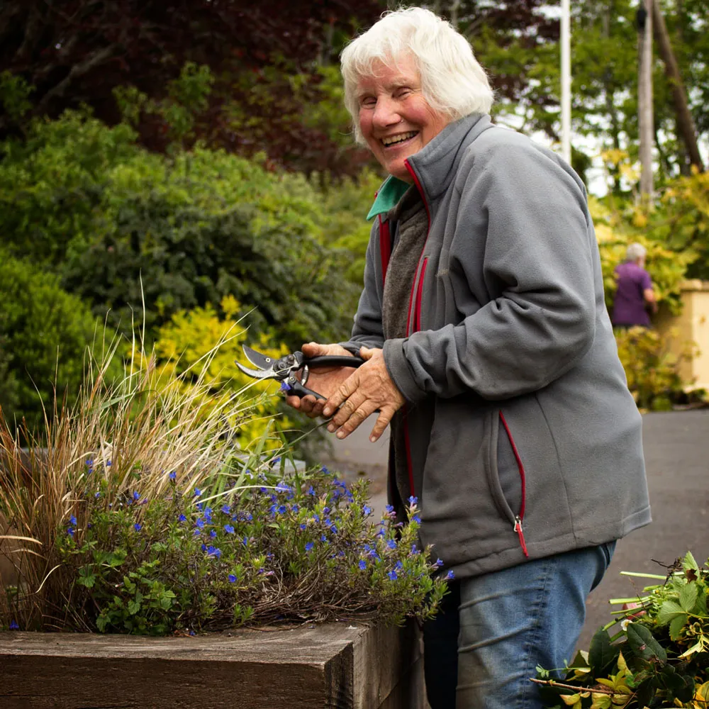 A volunteer at Skanda Vale Hospice garden
