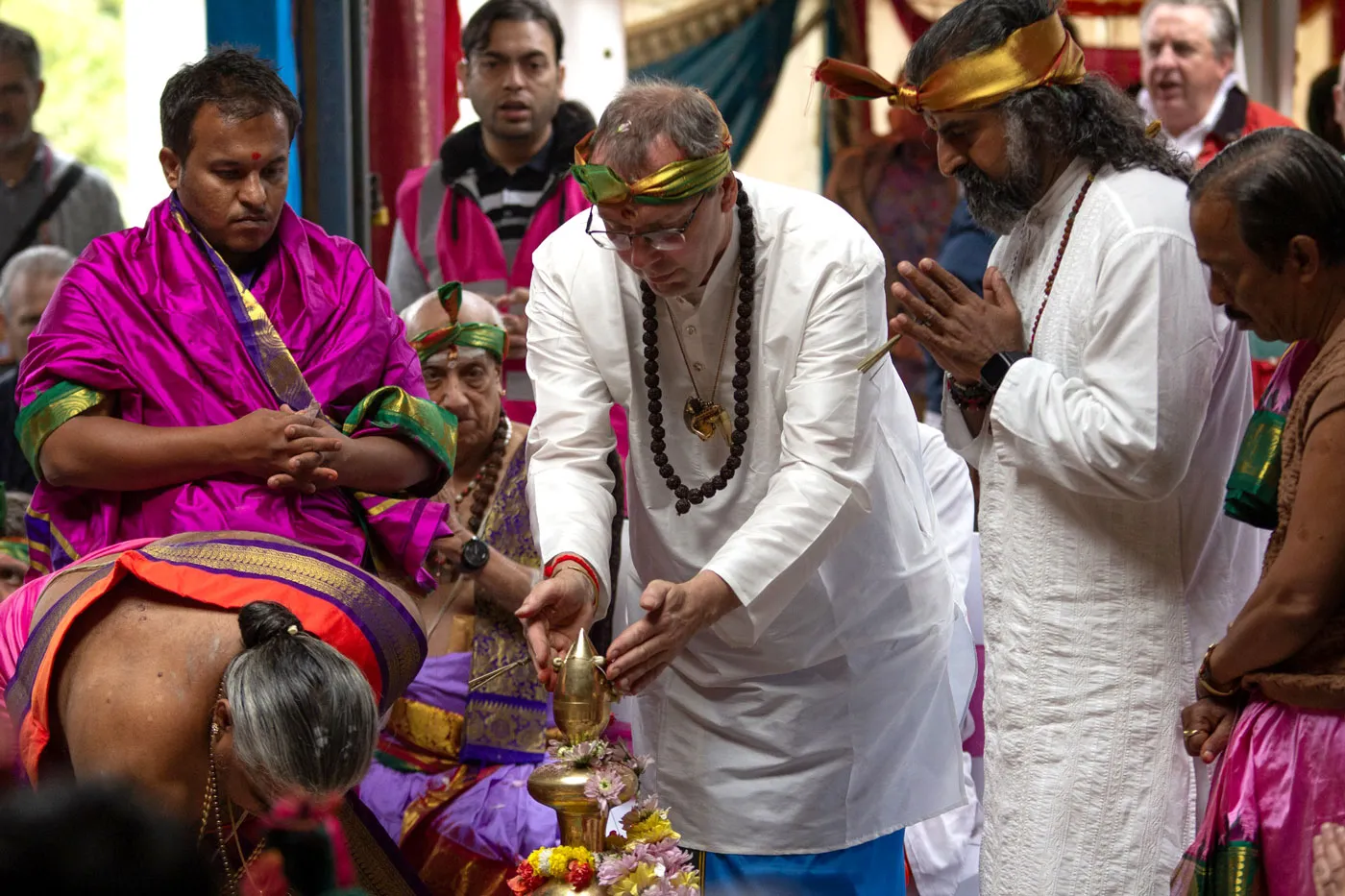 Priests perform a puja to the shikhara, or spire, of the new Shirdi Sai Temple