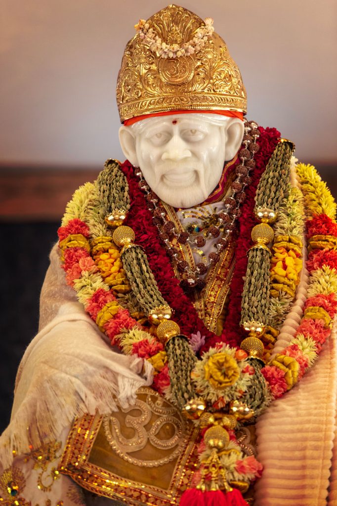A white marble statue or murthi of Shirdi Sai Baba at Skanda Vale